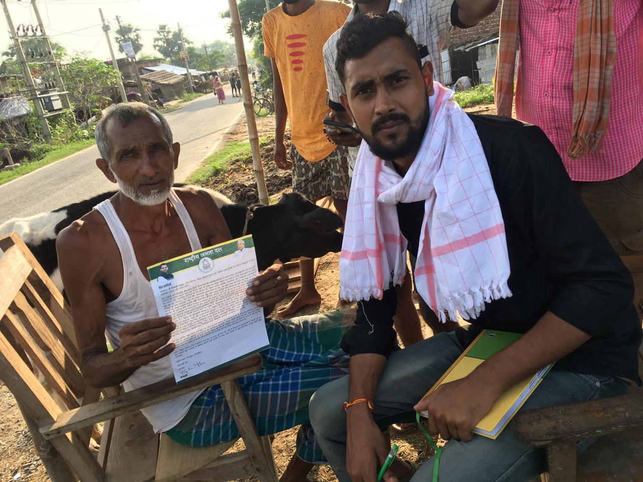 Political Mitra Volunteers engaging with voters during a door-to-door outreach campaign for Tejaswi Yadav